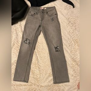 Levies size 12 petite grey in color